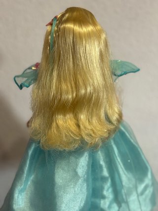 Barbie Ruiseñor Songbird con pájaro funcionando.