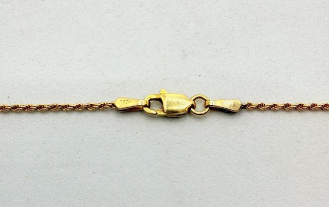 Cadena Salomónica de oro de 18k, 3.65 g, 45.5 cm.