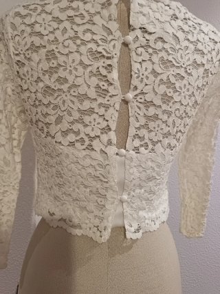 Top encaje blanco manga tres cuartos