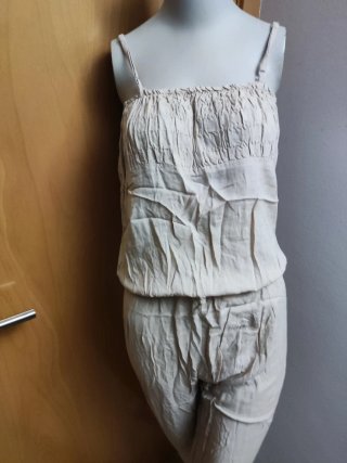 Mono beige tirantes