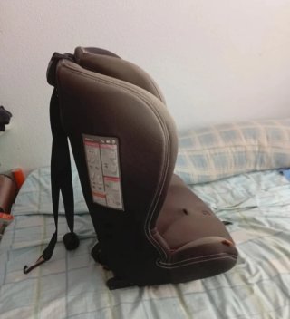 Alzador de niños para coche