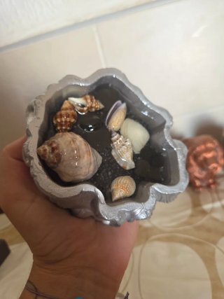 Centro de mesa,caracolas de mar,figuara