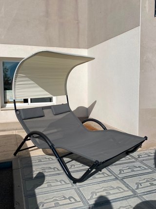 Tumbona doble con parasol
