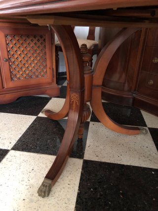 Mesa de comedor antigua de madera extensible