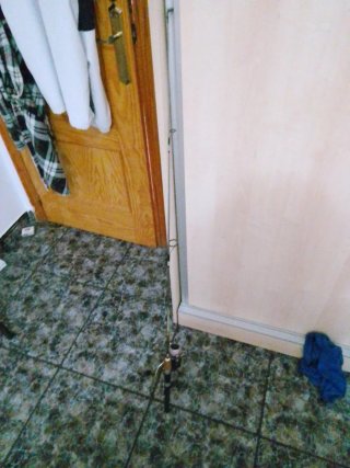 Caña de pescar con carrete