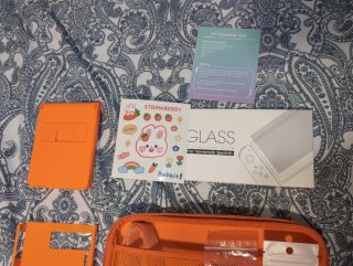 Kit Accessori Nintendo Switch Arancione