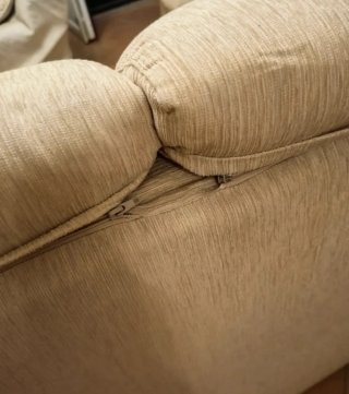 Divano ad angolo beige in tessuto