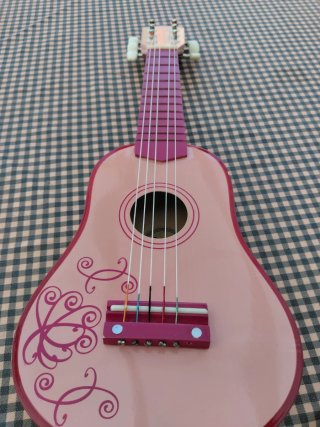 Guitarra infantil rosa