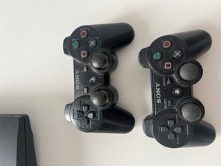 PS3 Slim + 2 Mandos Originales + Cables Pack Comp