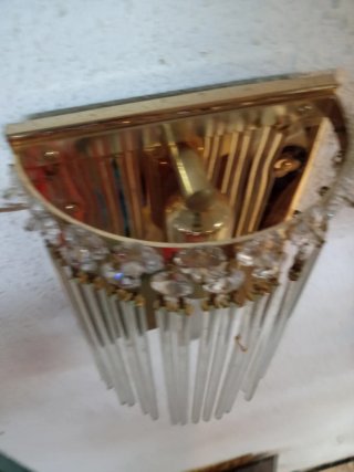 Apliques de pared de cristal y metal dorado