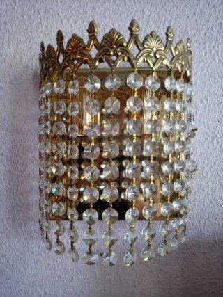 Apliques de pared de cristal y metal dorado