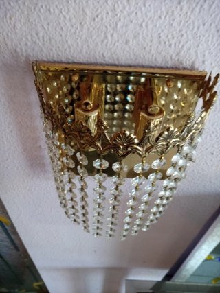 Apliques de pared de cristal y metal dorado