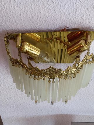 Apliques de pared de cristal y metal dorado