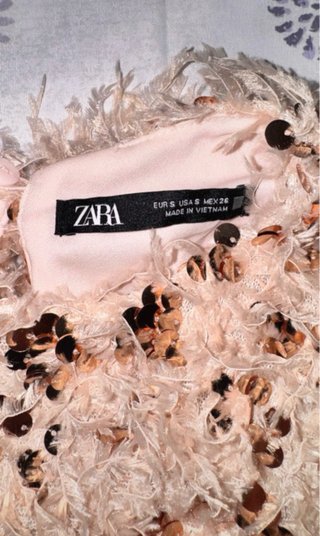 Top plumas y lentejuelas