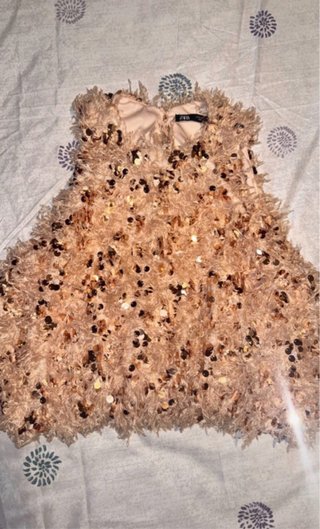 Top plumas y lentejuelas