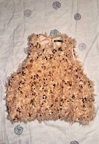 Top plumas y lentejuelas