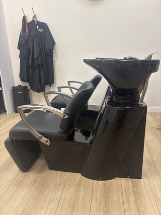 Sillón de peluquería negro