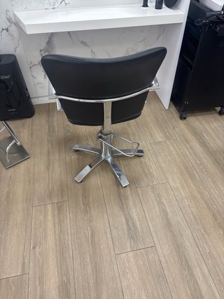 Sillón de peluquería negro