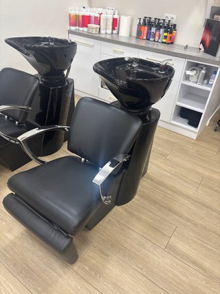 Sillón de peluquería negro