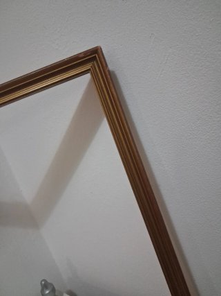 Cornice in legno dorato da sistemare