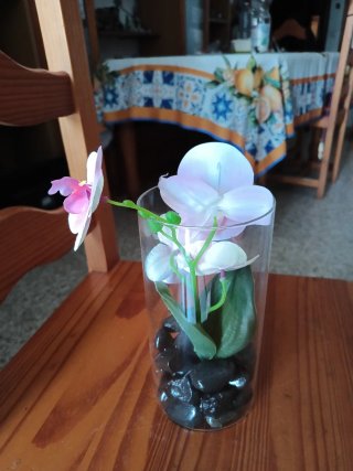 Orquídea artificial en tarro de cristal