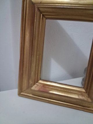 Cornice in legno dorato