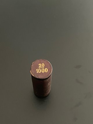 Estuche antiguo portamonedas.