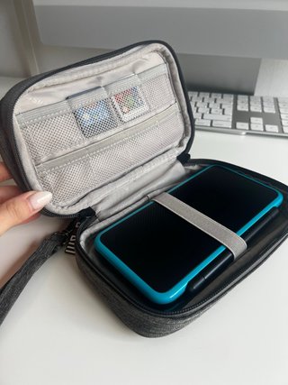 Nintendo 2DS XL + Caricatore + 2 Giochi