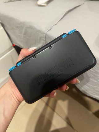Nintendo 2DS XL + Caricatore + 2 Giochi