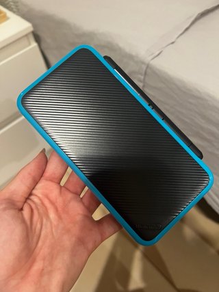 Nintendo 2DS XL + Caricatore + 2 Giochi