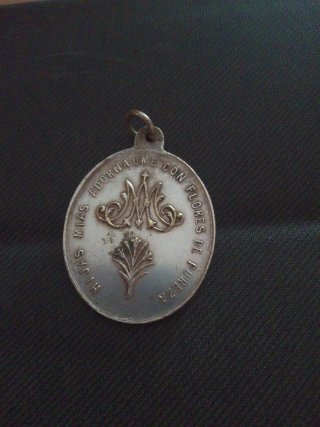 Medalla de plata antigua