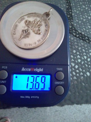 Medalla de plata antigua