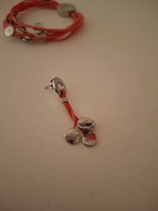 Conjunto Pulsera y Pendientes V&L. Color rosa.