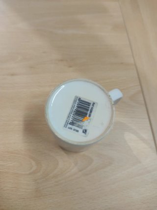 Taza de porcelana blanca