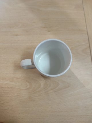 Taza de porcelana blanca