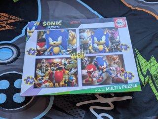 Un libro puzzle,un puzzle y un juego