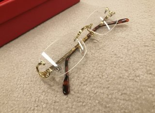 Gafas Cartier Doradas
