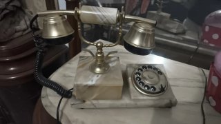 Teléfono antiguo de mármol y latón