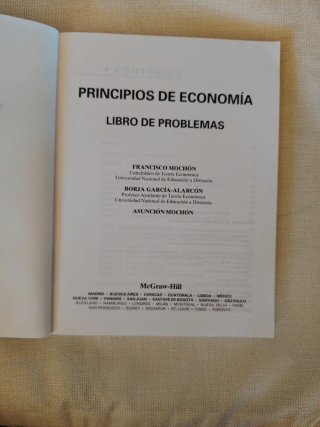 Principios de economía : libro de problemas