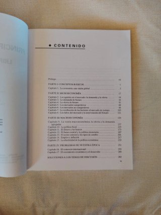 Principios de economía : libro de problemas