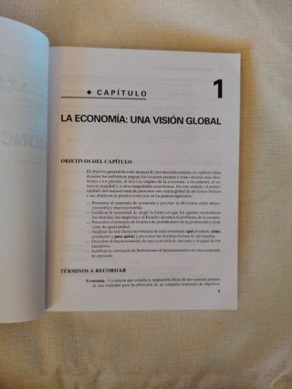 Principios de economía : libro de problemas
