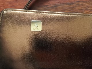 Bolso de fiesta dorado con asa corta