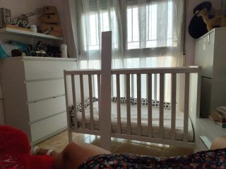 Cuna de madera con colchón