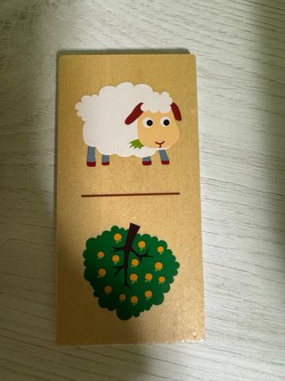 Dominó de madera con animales de granja