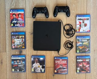 PS4 Slim 1TB Negra + 2 Mandos + 8 Juegos