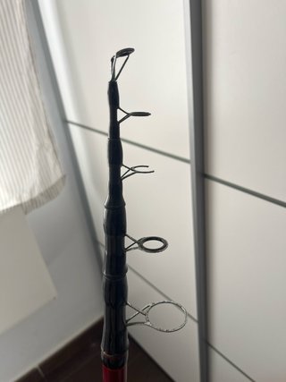 Caña de pesca Symbios 3,90m con carrete Caperlan.