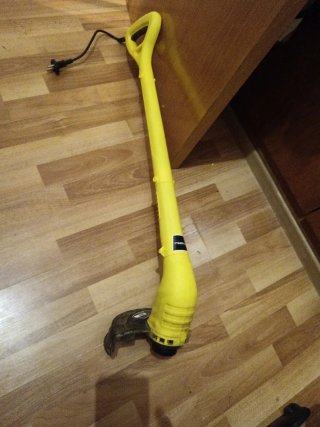 Cortabordes eléctrico amarillo