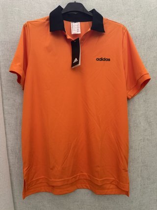 Polo Adidas – Naranja con cuello negro, nuevo con
