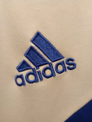 Camiseta deportiva Adidas hombre azul y blanca