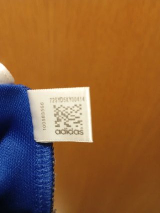 Camiseta deportiva Adidas hombre azul y blanca